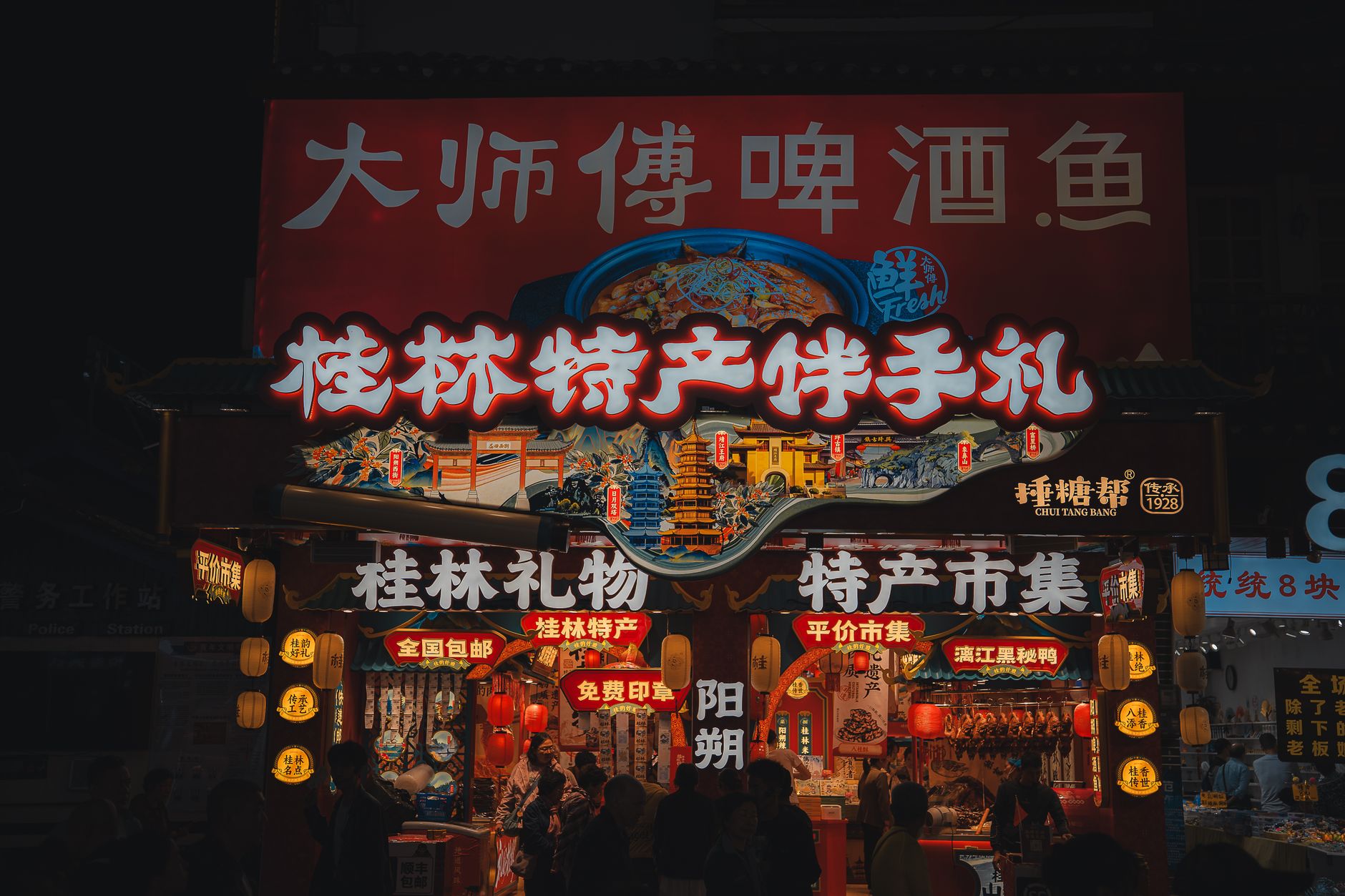 A street market showcasing local cultural products amidst global brands. — globalization debate