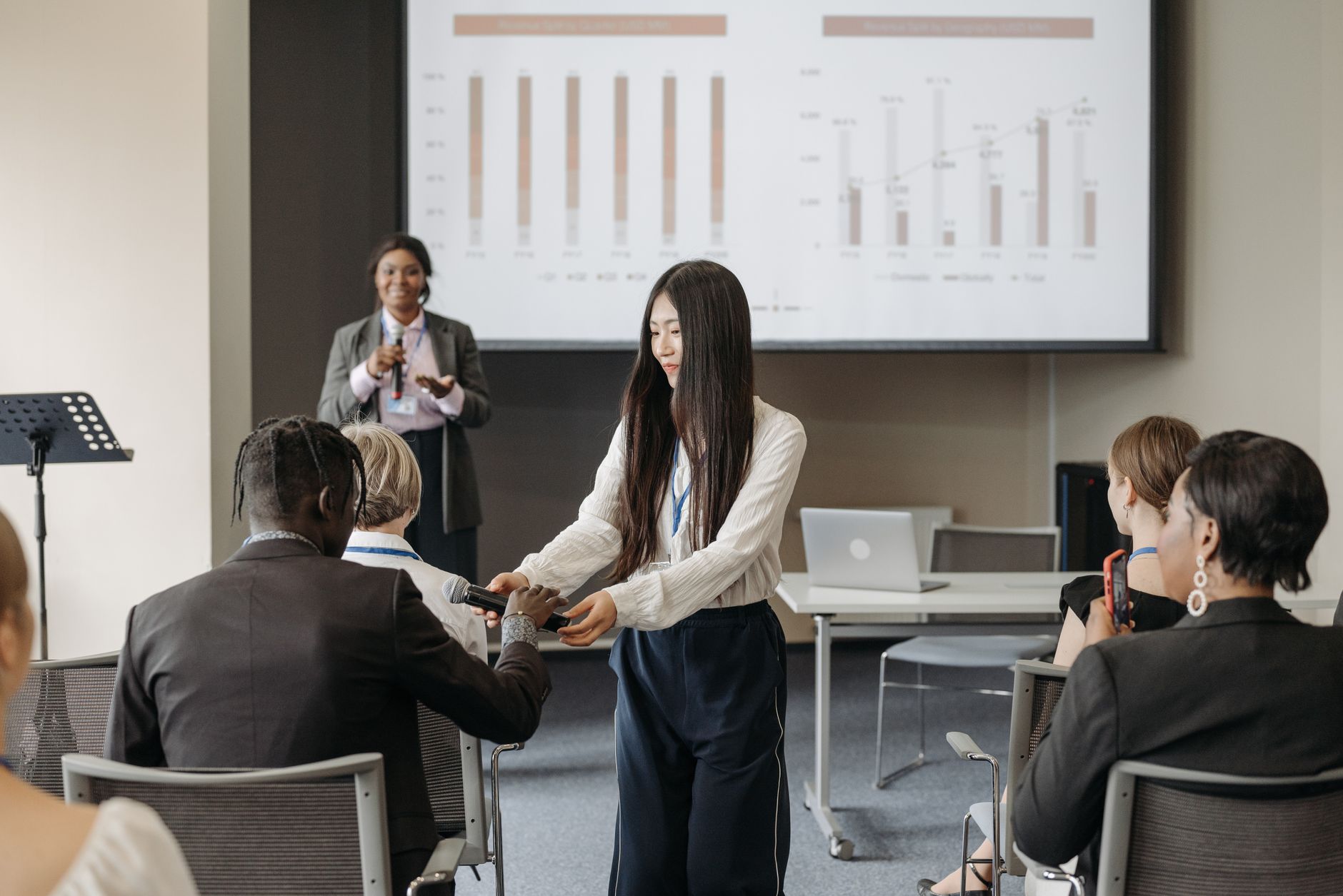 A visual representation of audience engagement techniques like polls or Q&As in a debate setting. — audience engagem…