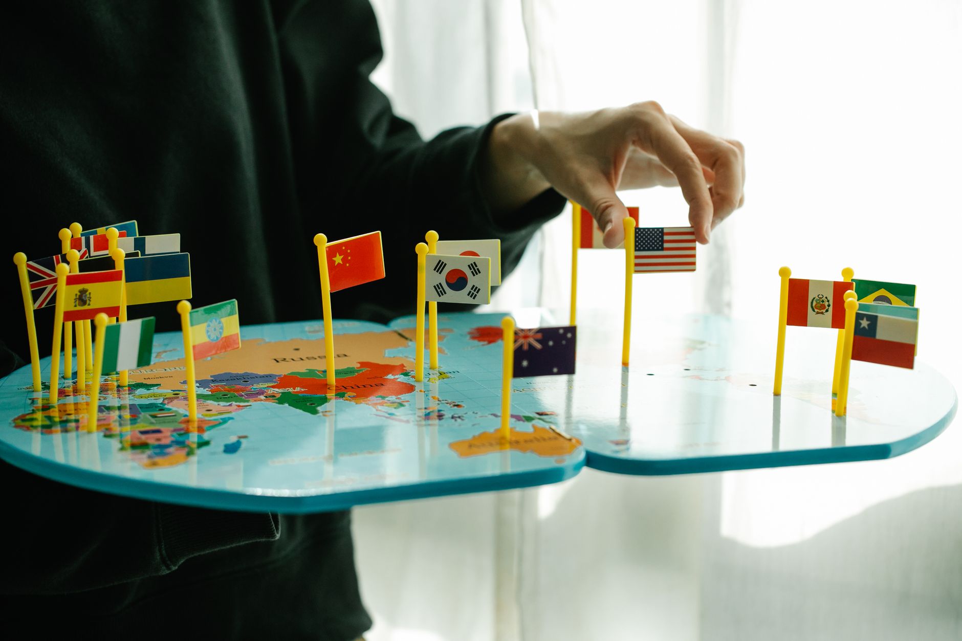 A world map highlighting cultural exchanges influenced by globalization debate.