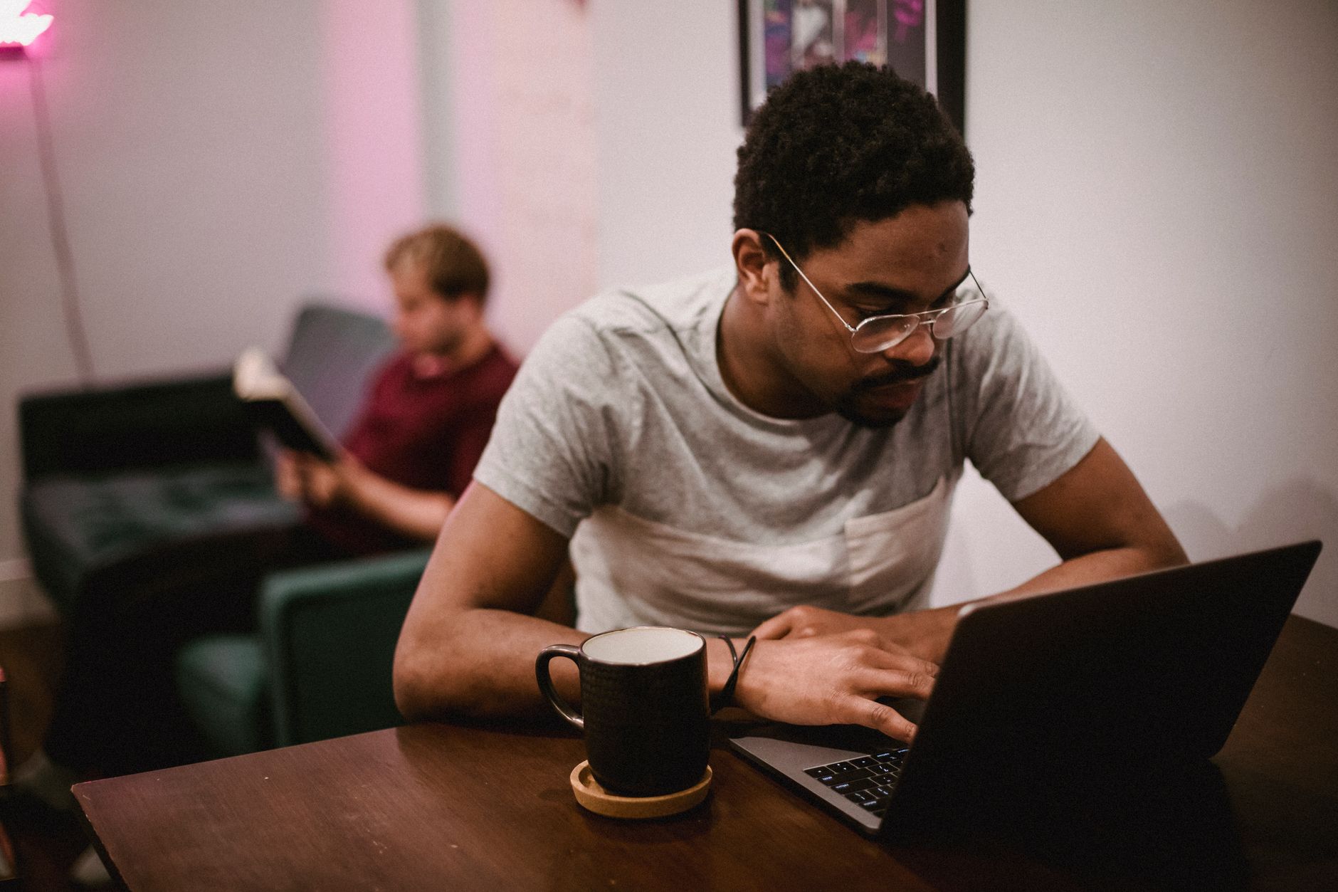 An infographic outlining the pros and cons of remote work for employees and employers — remote work debate