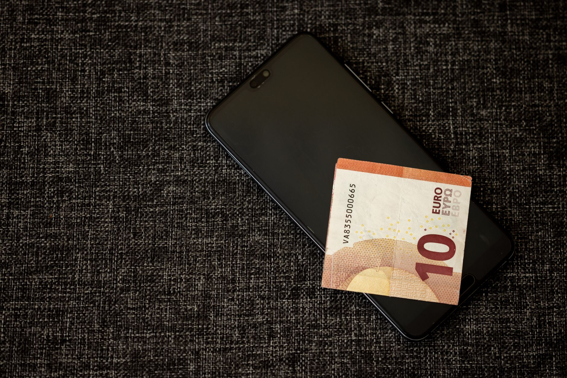 Infographic showing the decline of cash usage across various countries over the last decade, reflecting key points from the cashless society debate.