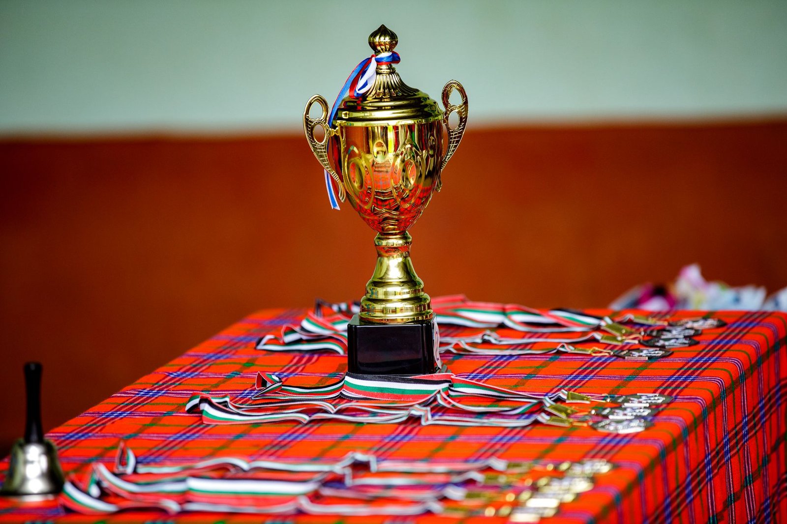 A close-up of a debate competition trophy, symbolizing the achievement of excellent debate skills. — debate topics