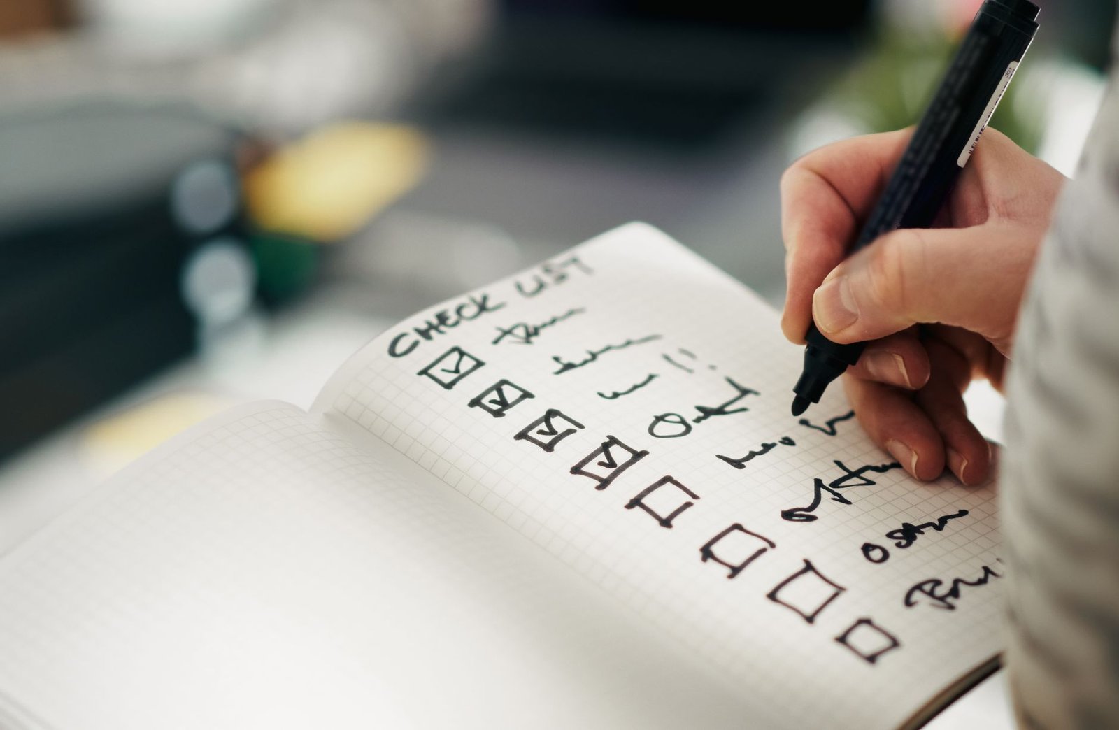 A close-up of a debate preparation checklist with key tasks listed.