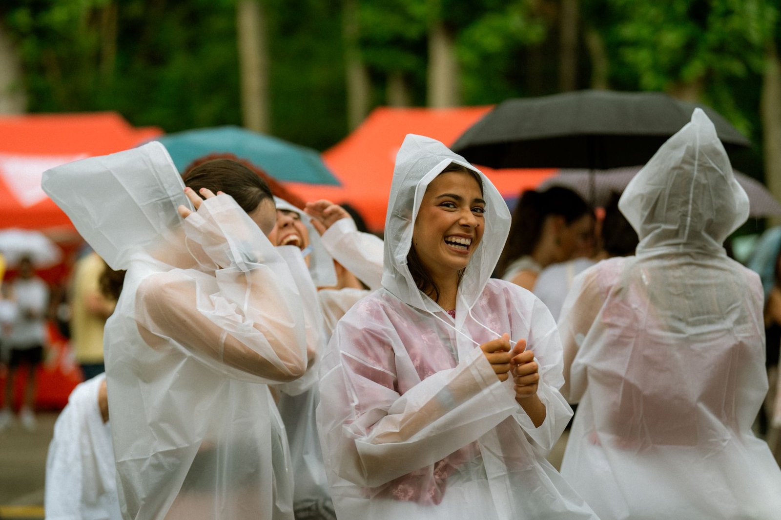 A crowd reacting positively with laughter during a humorous debate moment. — humor in debates