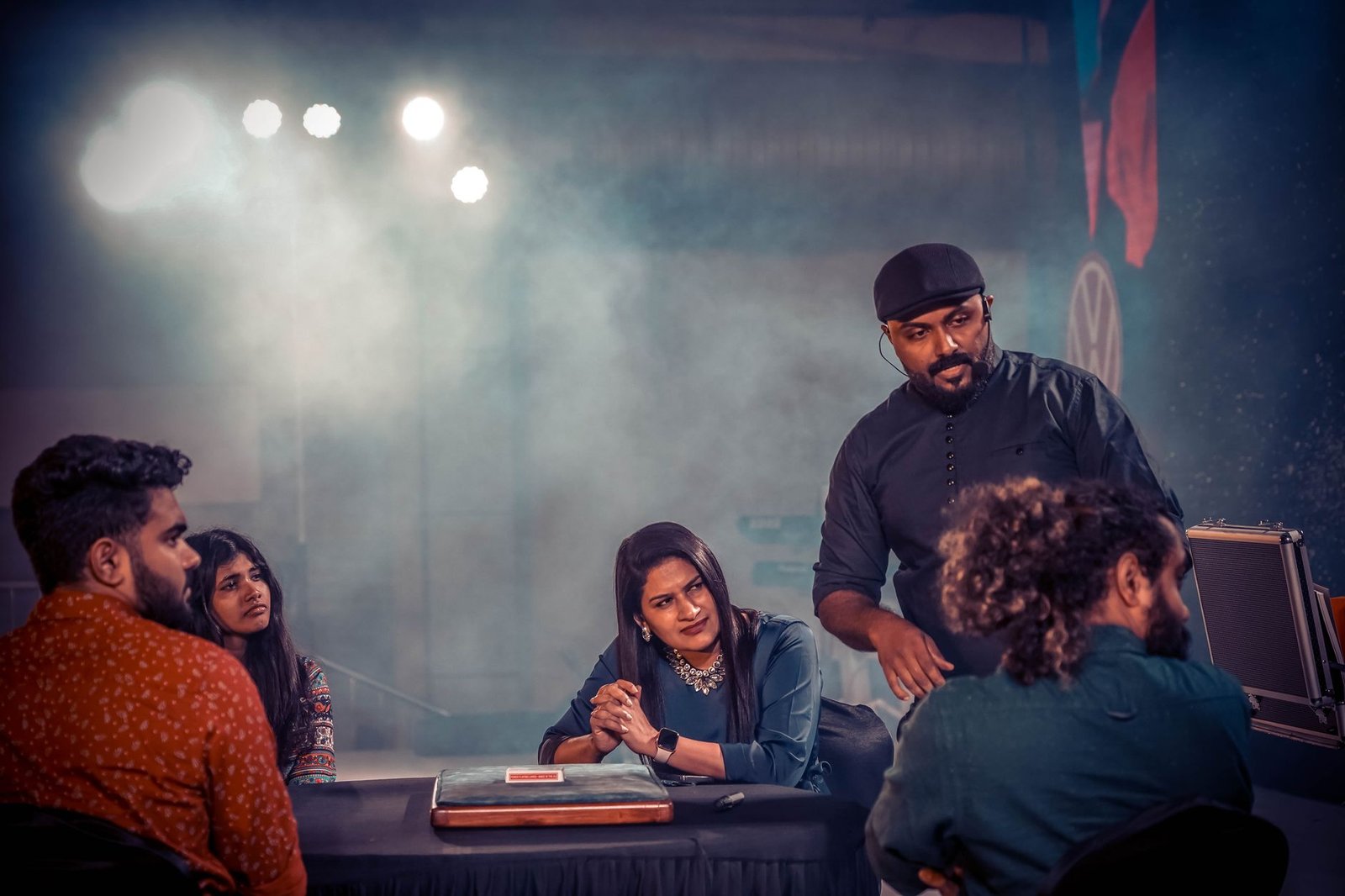 A famous debater presenting their argument on stage, showcasing body language and engagement — persuasion techniques