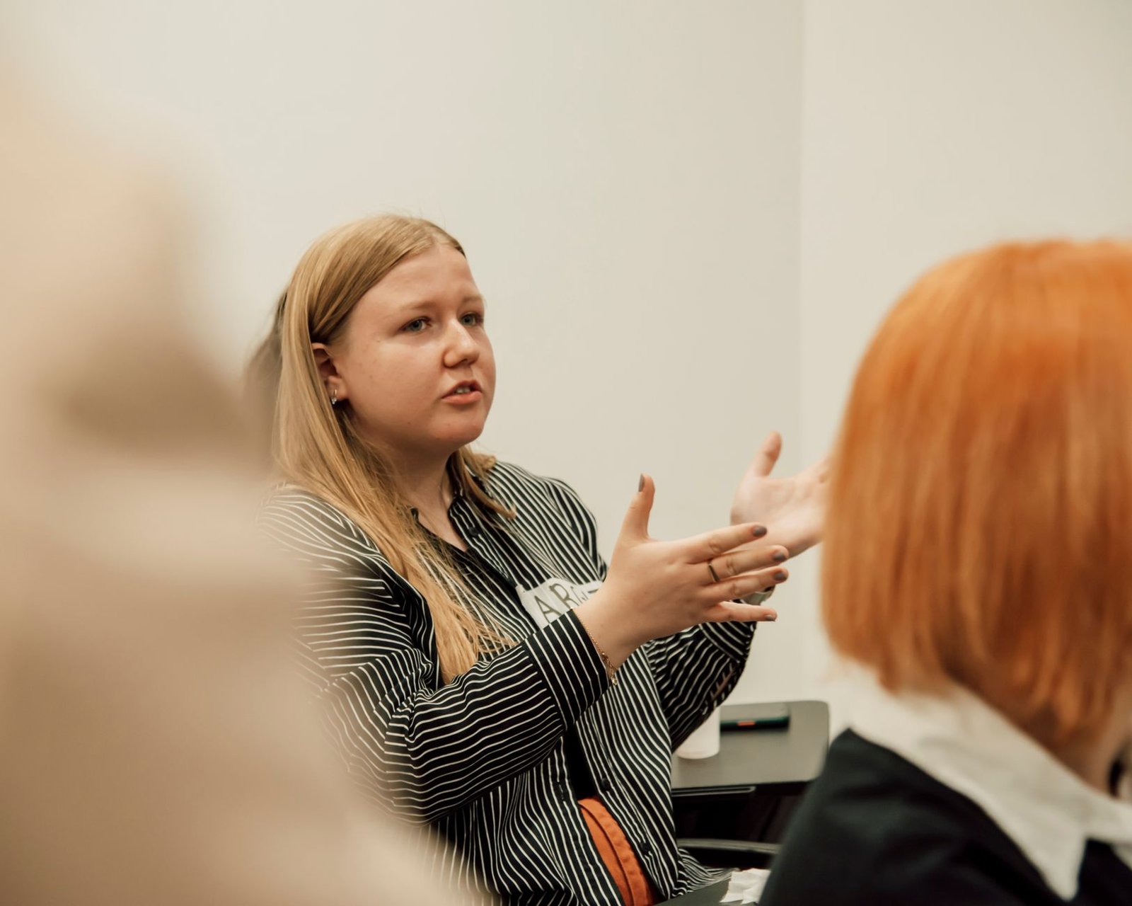 A photo of a Lincoln-Douglas debate in action, showcasing participants engaging with various debate formats.