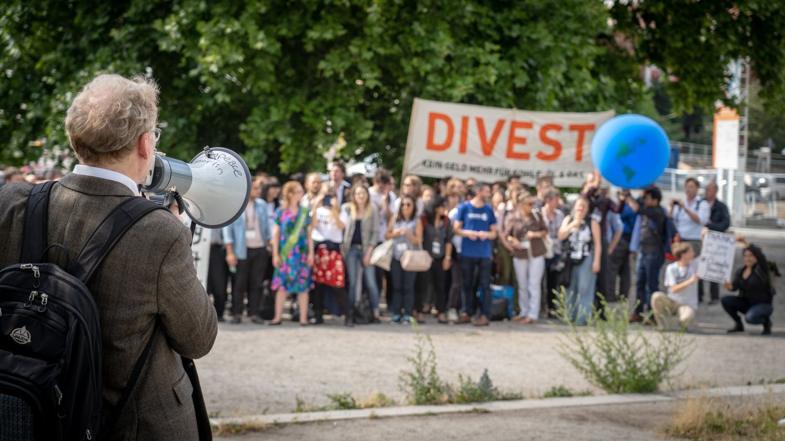 A photo of a community event focused on climate advocacy, showcasing public engagement in the climate change debate.