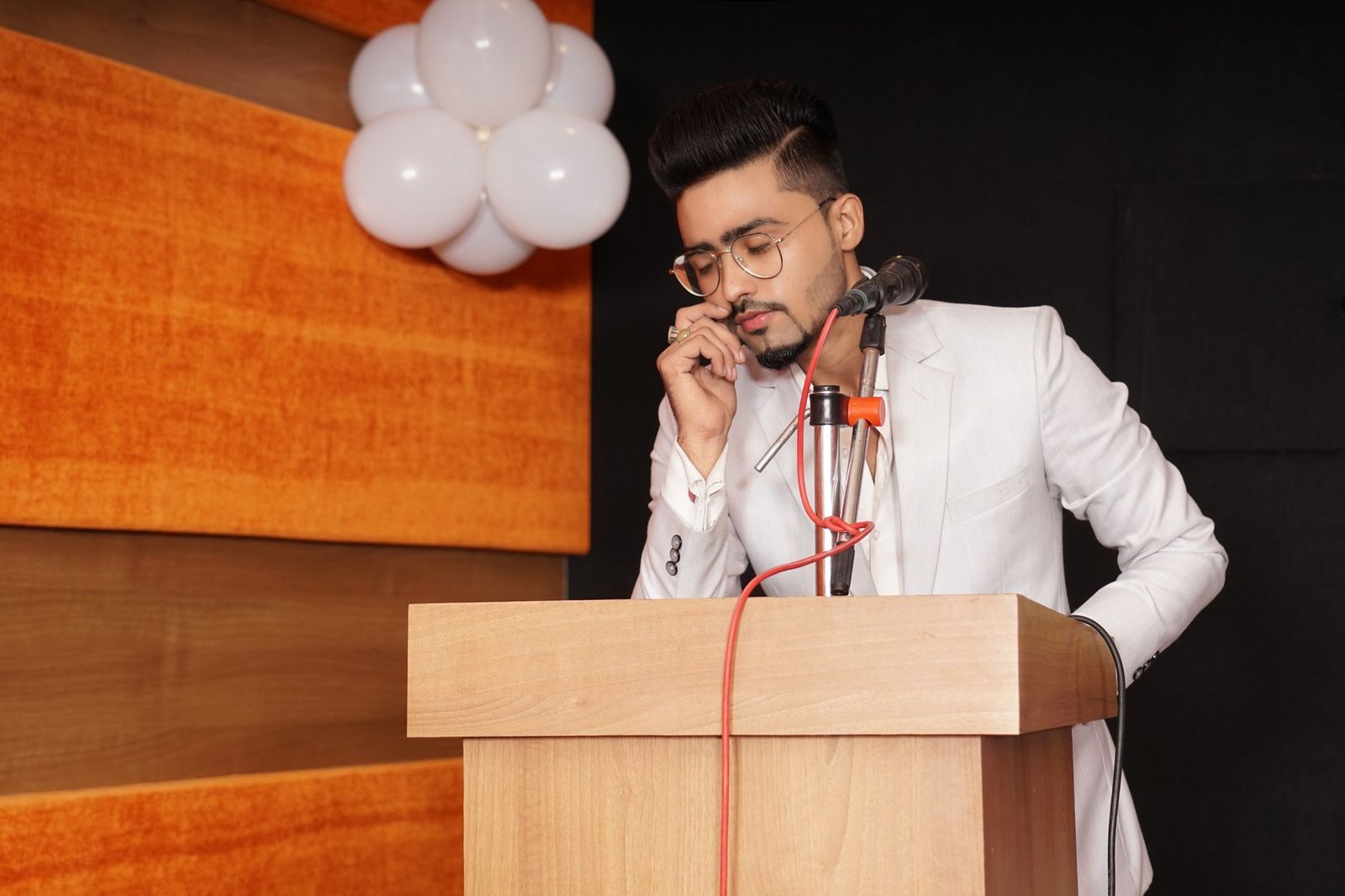 A photo of a debate competition showcasing speakers using rhetorical techniques. — rhetoric in debate