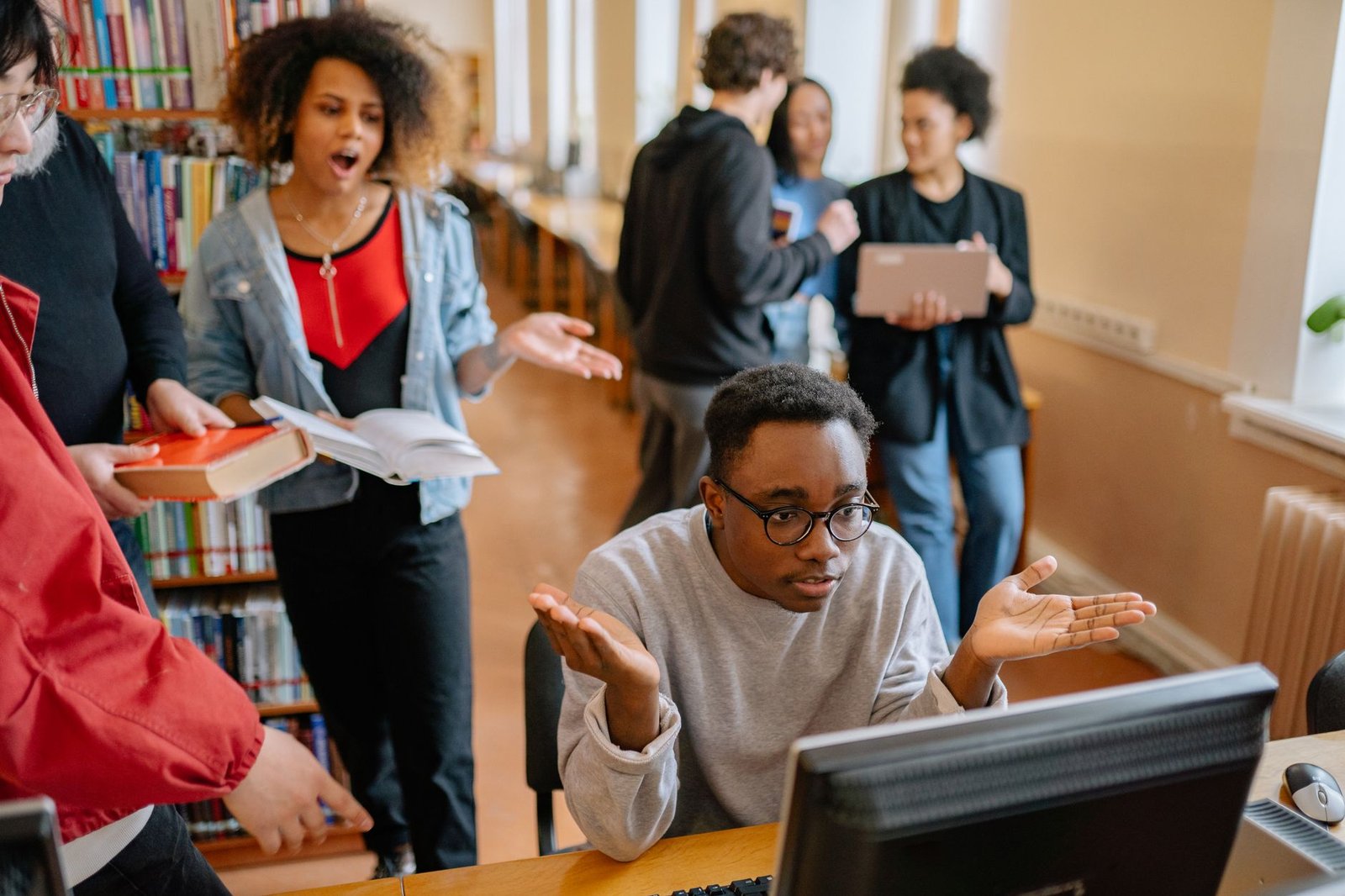 A photo of a diverse group of students discussing college options, emphasizing accessibility in education. — free colleg…
