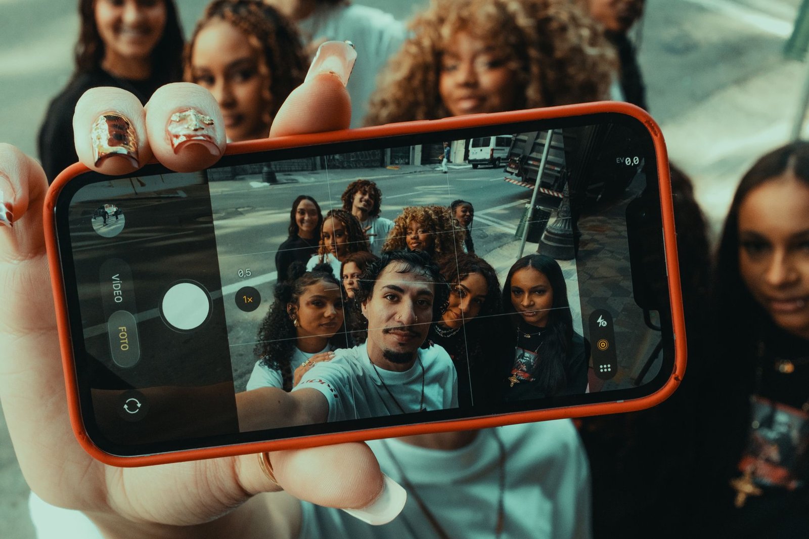 A photo of a group of friends interacting face-to-face versus on their devices. — technology relationships