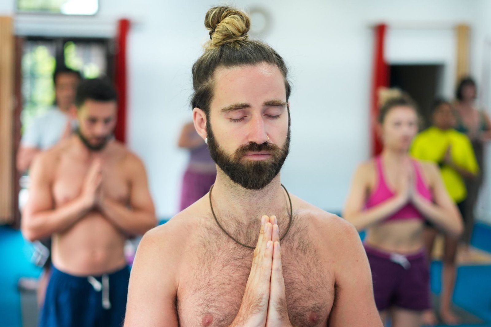 A photo of a person practicing mindfulness techniques to enhance focus, with social media distractions in the background. …
