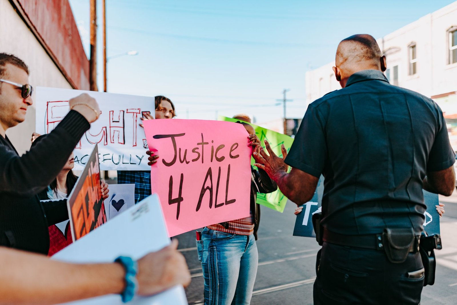A photo of a protest or public discussion about universal basic income, showcasing community engagement.