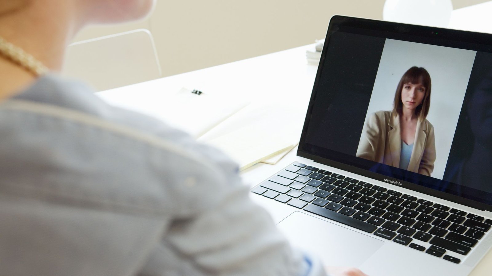 A photo of a virtual debate taking place on a video conferencing platform — online debating
