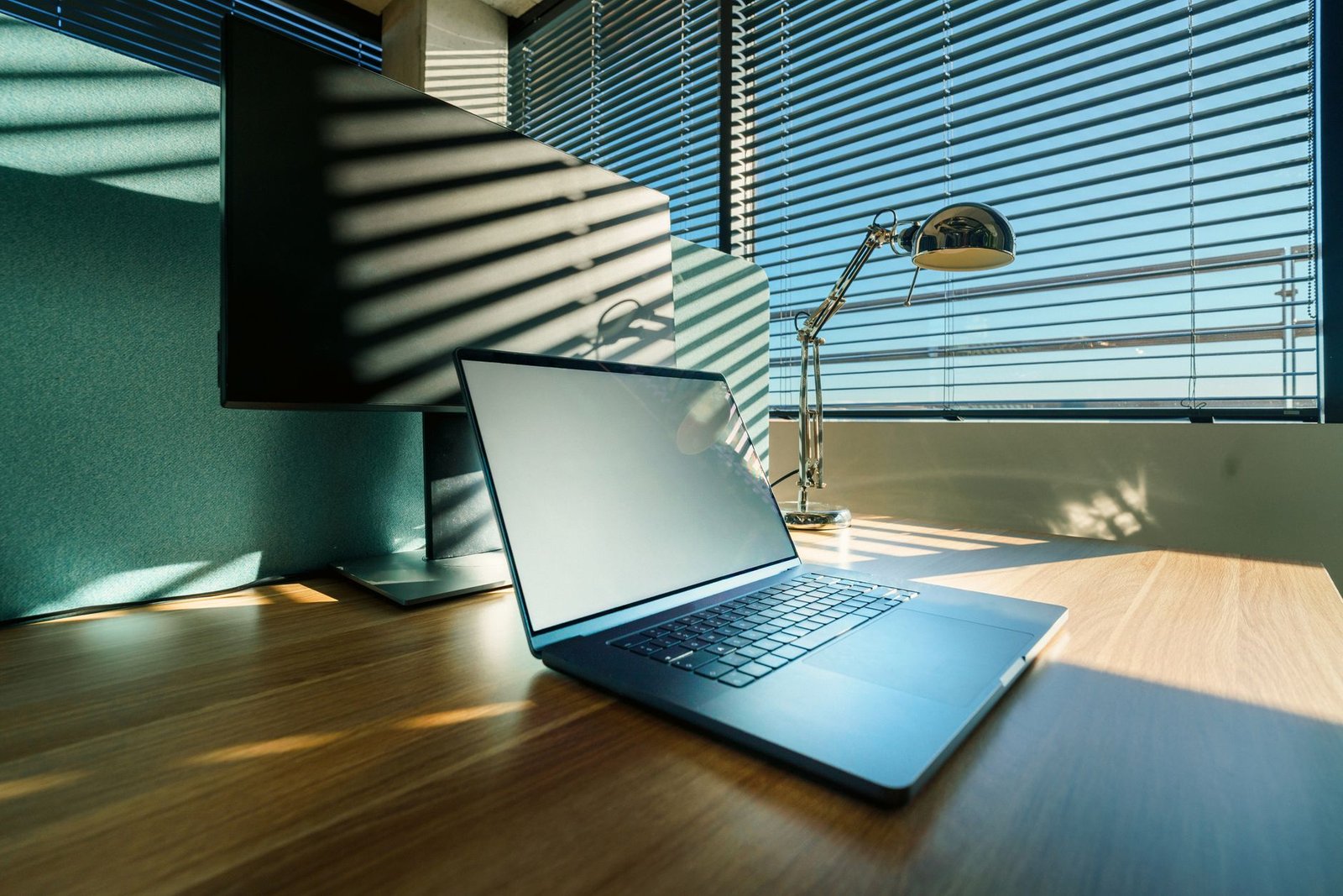 A split image showing a vibrant office environment and a home office setup. — remote work debate