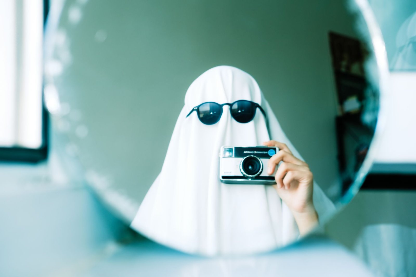 A split image showing ghost sightings in modern media vs. scientific skepticism. — ghosts debate