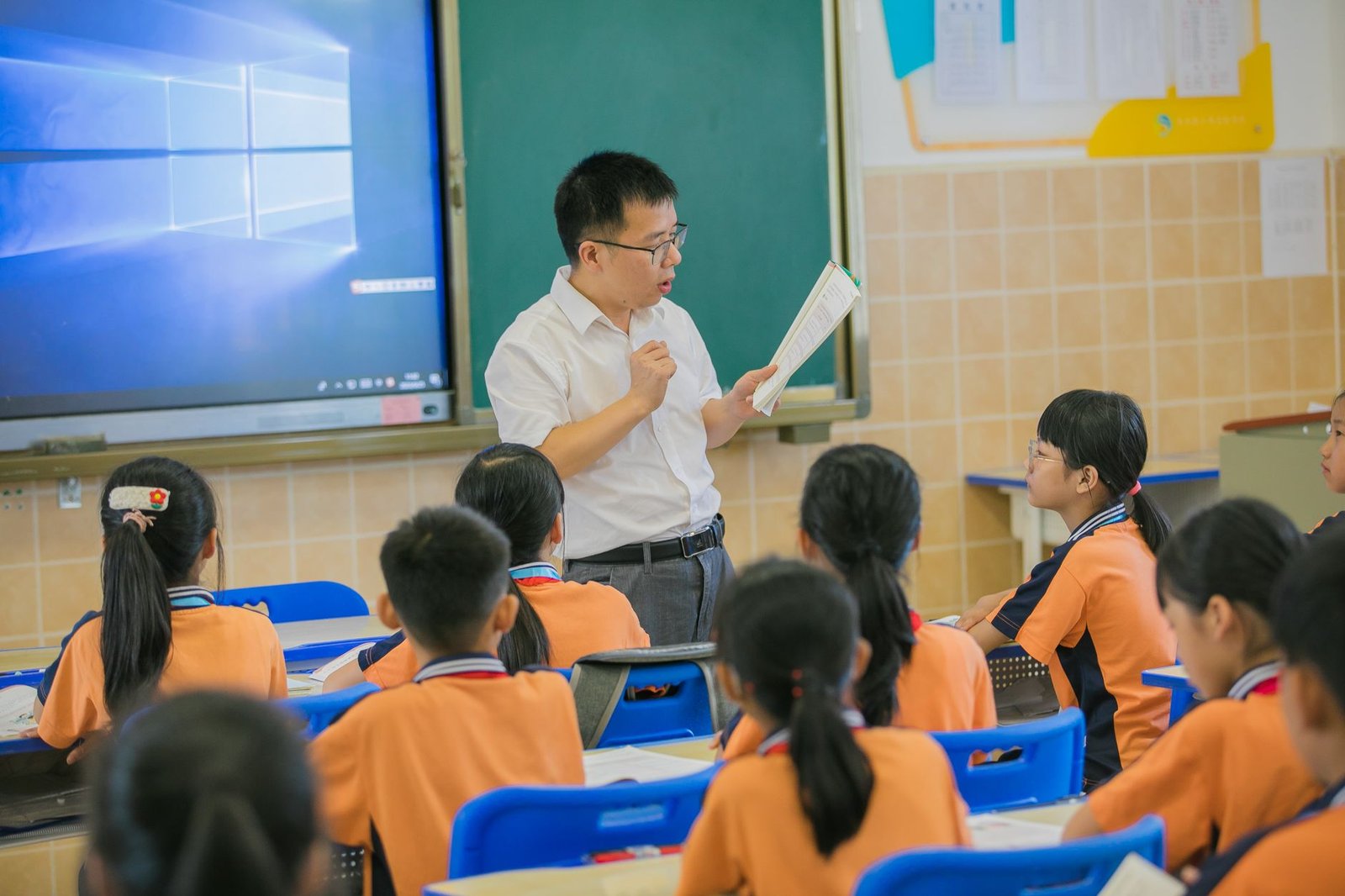 A teacher conducting a training session on effective technology use in education. — technology in education