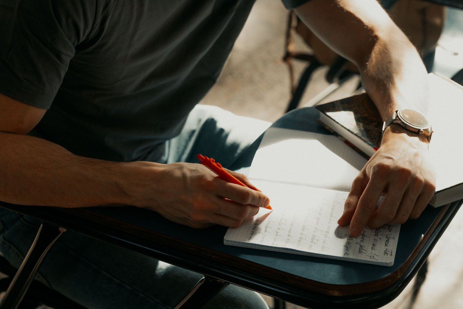 A thoughtful introvert preparing notes for a debate — introvert debate strategies