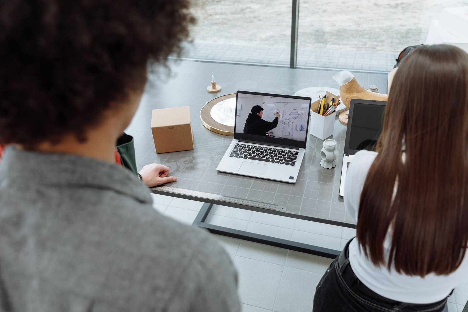 A visual representation of hybrid work models, illustrating flexibility and collaboration. — remote work debate