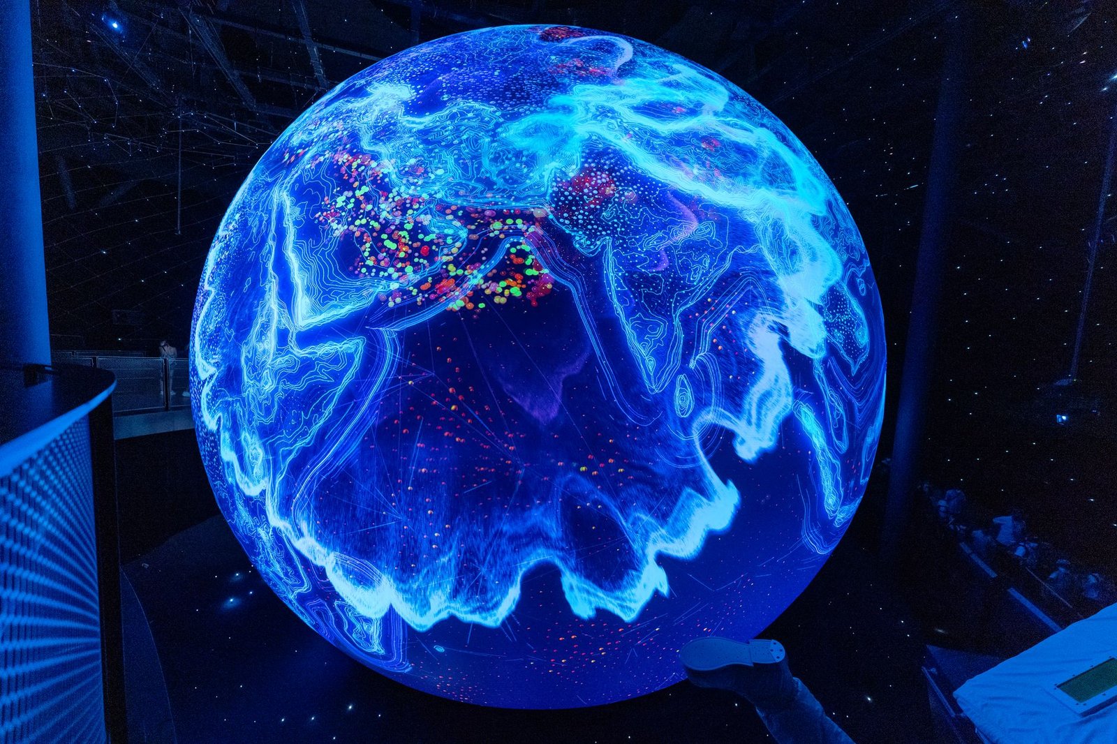 A visual representation of the global reach of virtual debates, with maps or audience demographics.