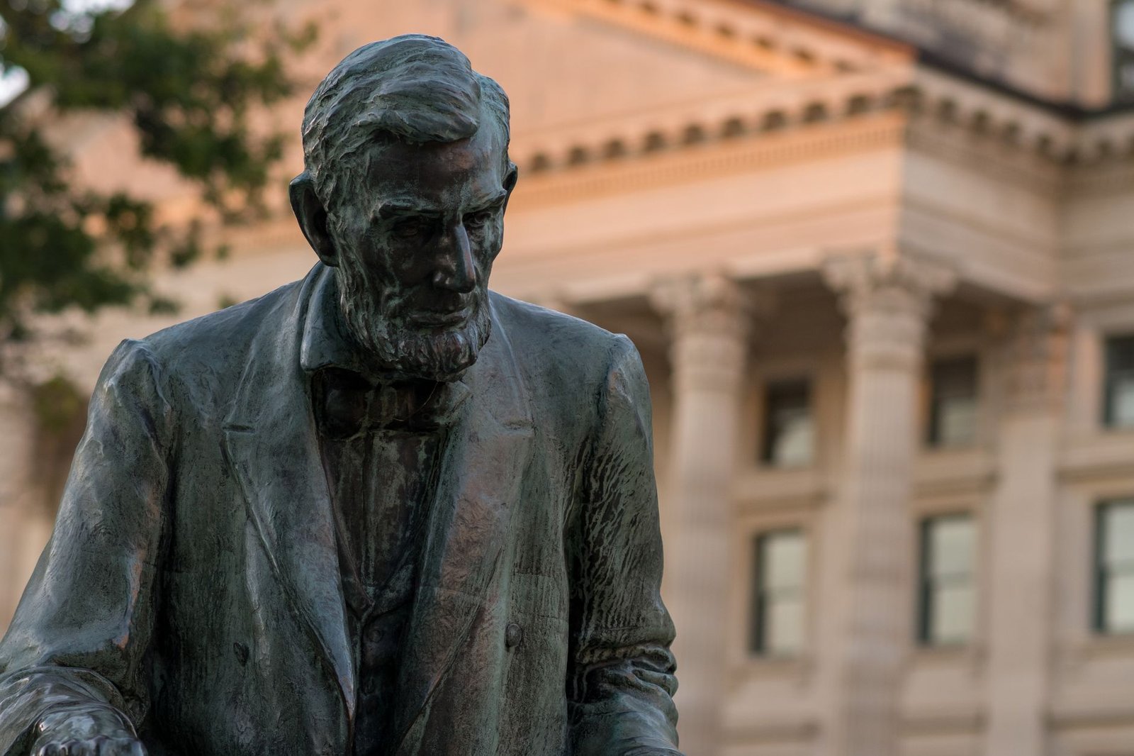 An illustration of the Lincoln-Douglas debates showcasing Abraham Lincoln and Stephen A. Douglas in a historical setting. …