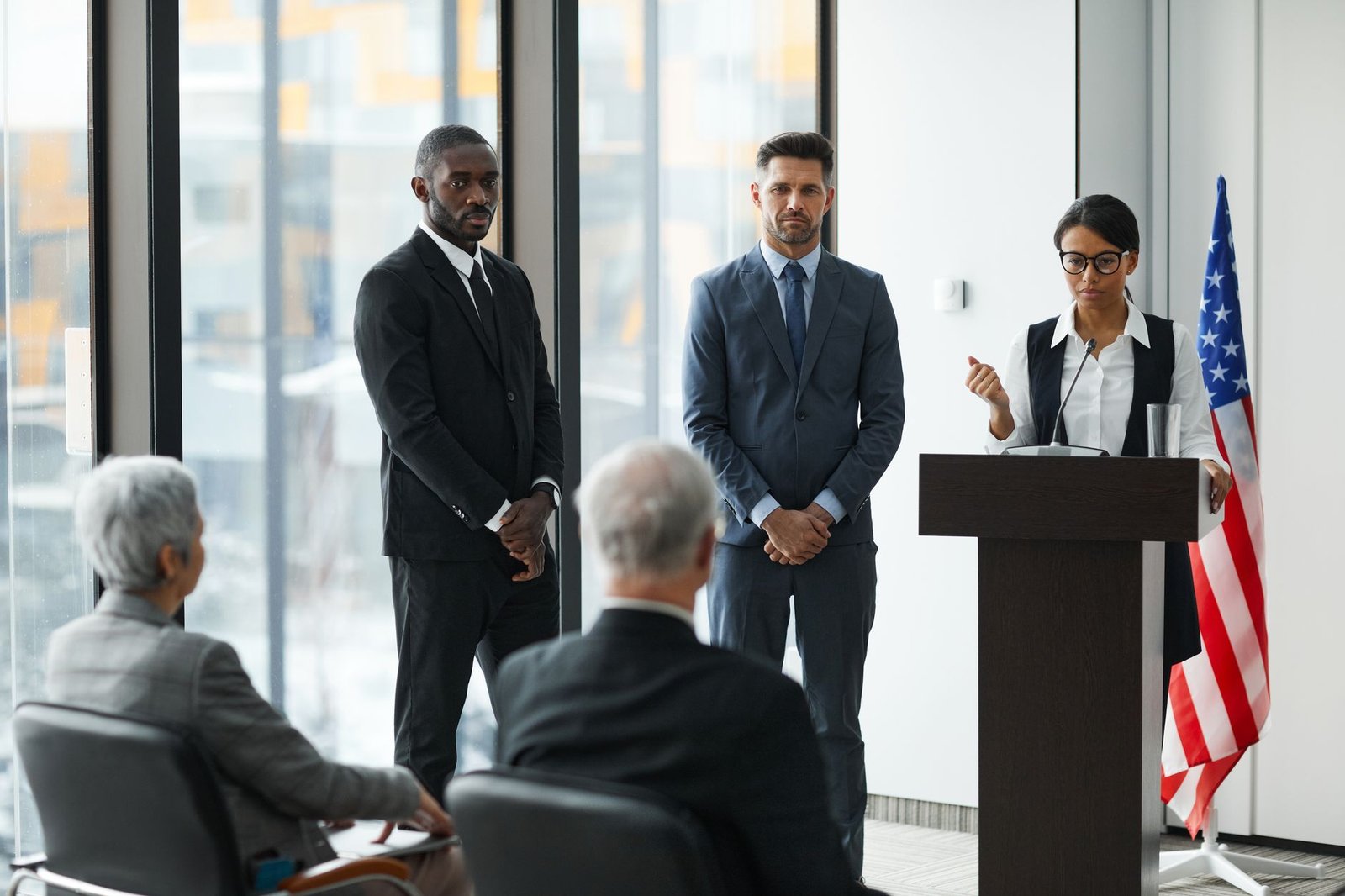 An image showing a diverse group of people engaged in a respectful debate, demonstrating active listening. — debate etiq…