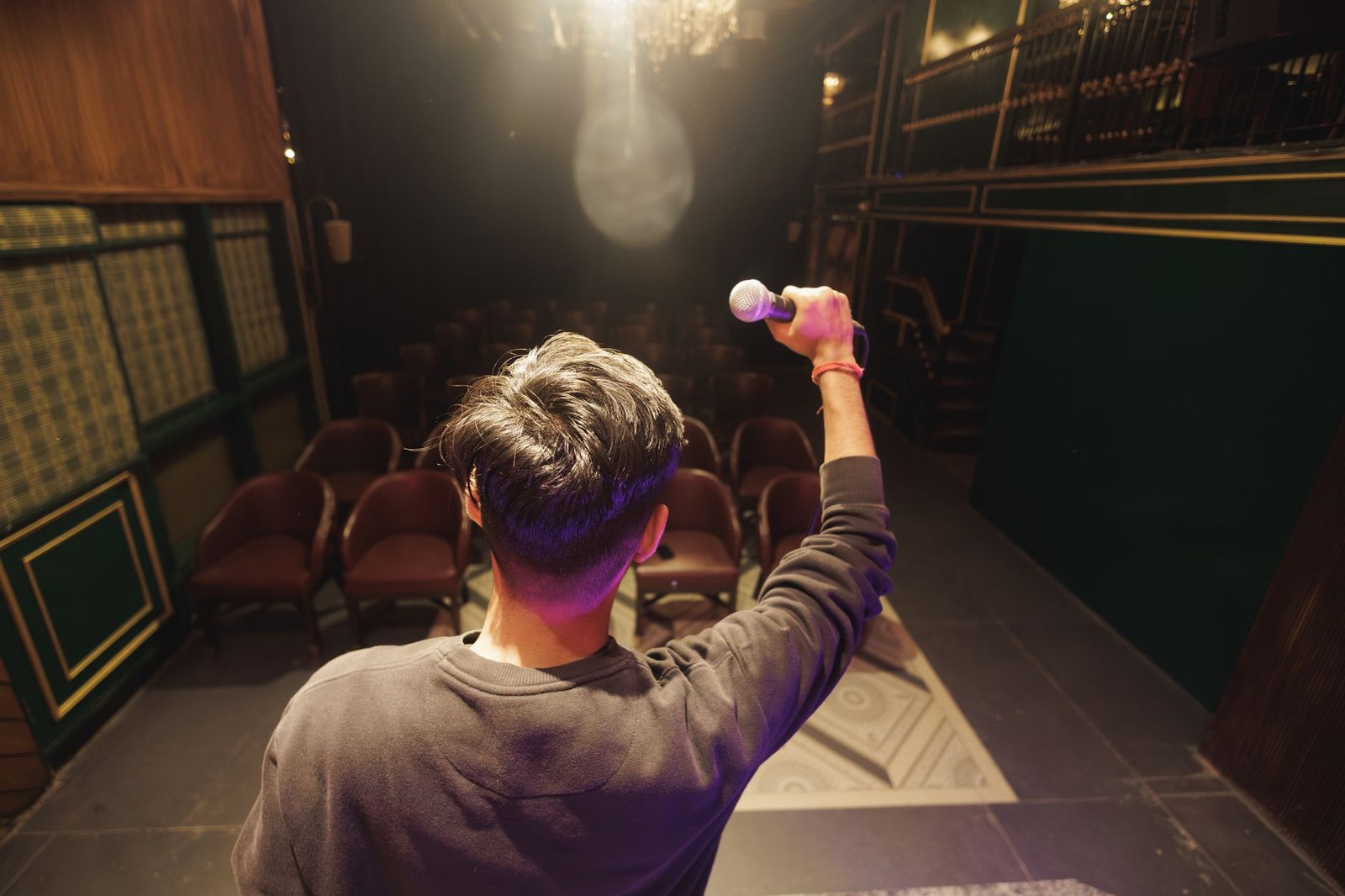 An individual rehearsing their speech in front of a mirror, showcasing confidence. — debate preparation