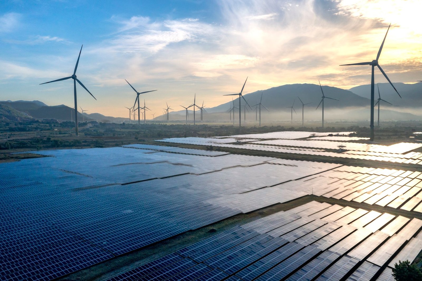 An infographic depicting the growth of solar and wind energy capacity globally. — renewable energy future