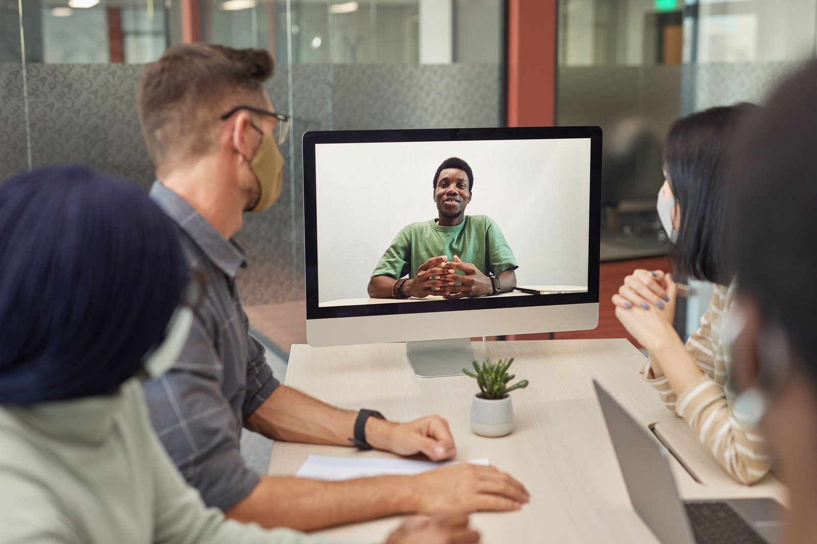 An online debate session with youth interacting via video conference tools. — youth in debates