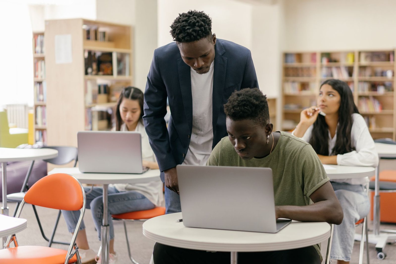 A classroom scene showing diverse students engaged in learning. — free college debate