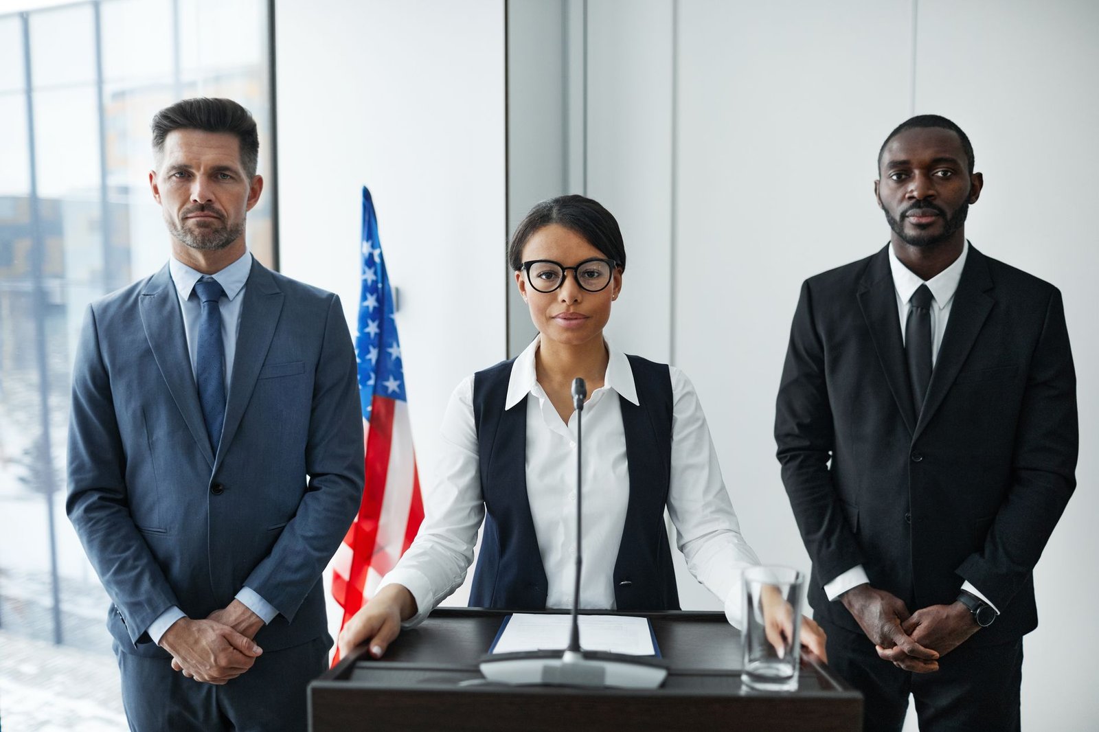 A photo of a diverse group engaged in a formal debate setting. — psychology of debating