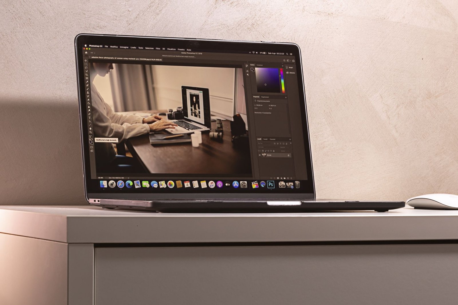 A split image showing a home office setup on one side and a traditional office on the other, illustrating the remote vs in…