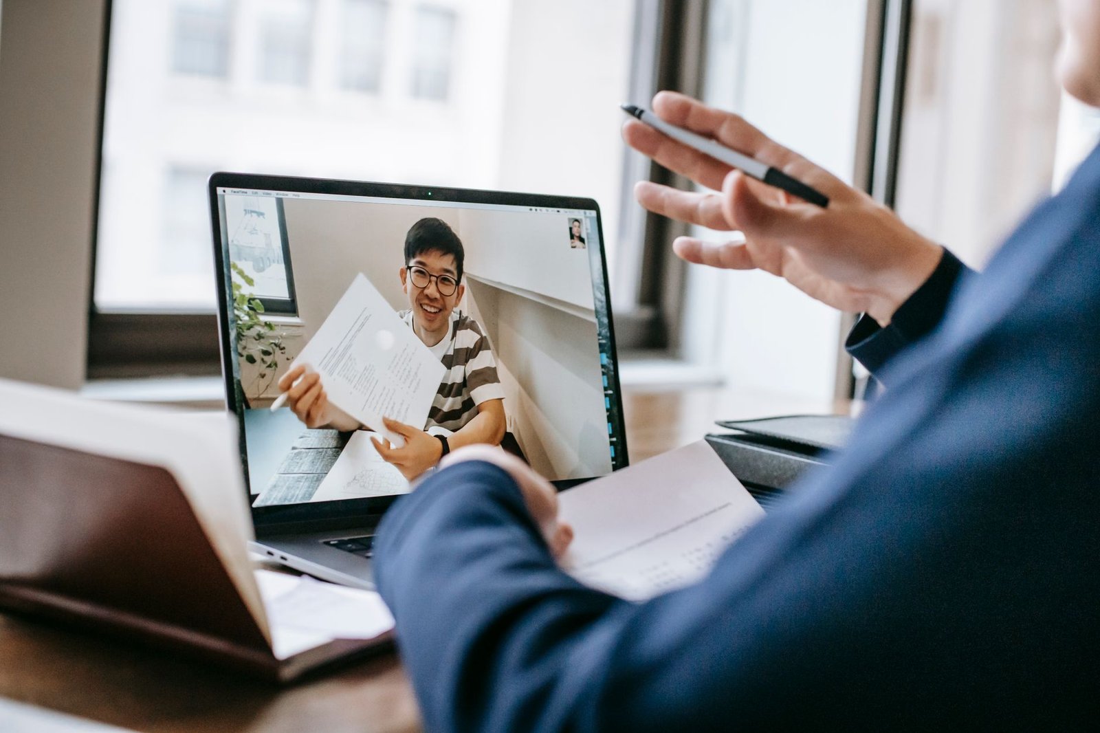A virtual meeting setup with participants engaging in an online debate. — debating online