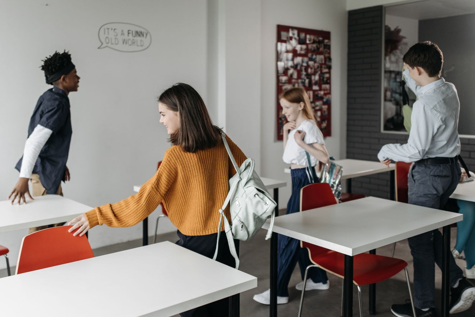A classroom setting showing diverse students engaged in learning, emphasizing the importance of education for social mobil…