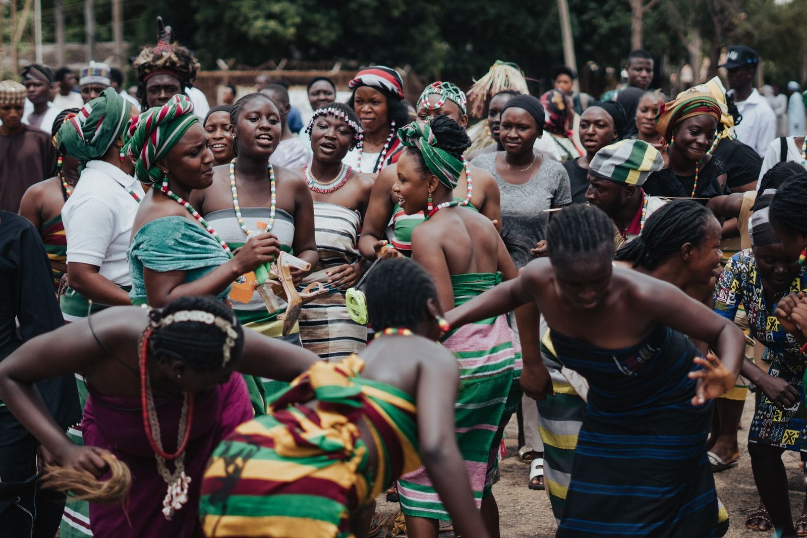 A diverse group of individuals participating in a local cultural festival. — globalization debate