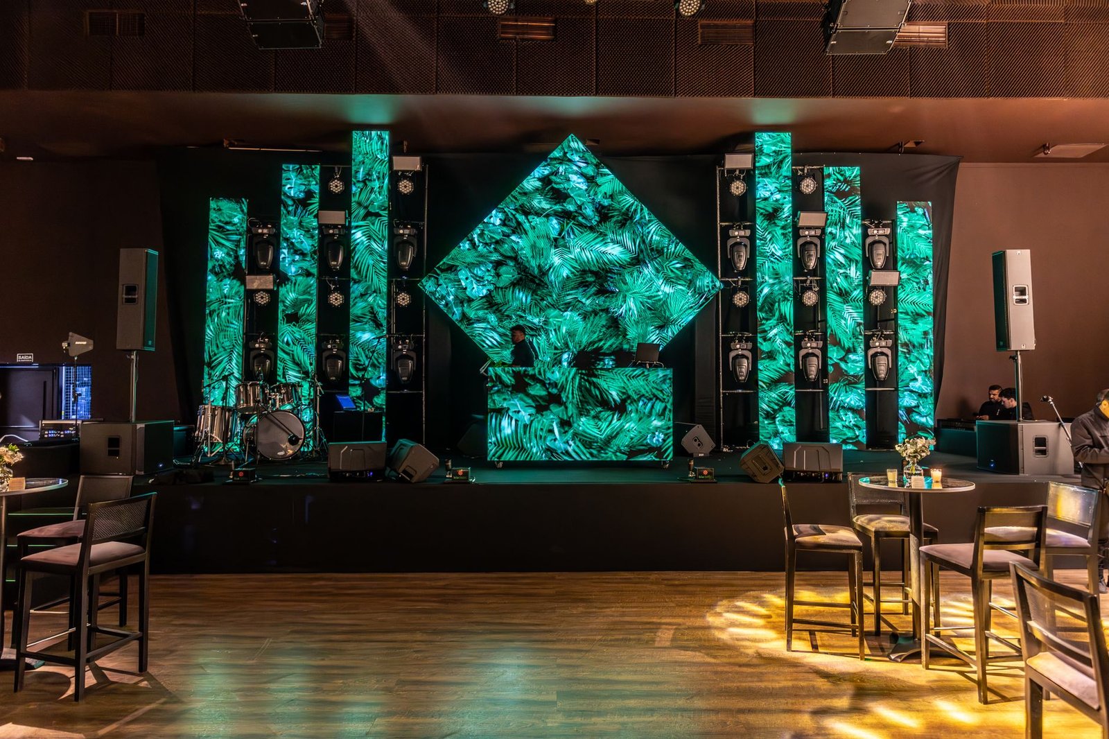 A futuristic image of a debate stage equipped with AI technology, showcasing its integration in live events. — AI in deb…