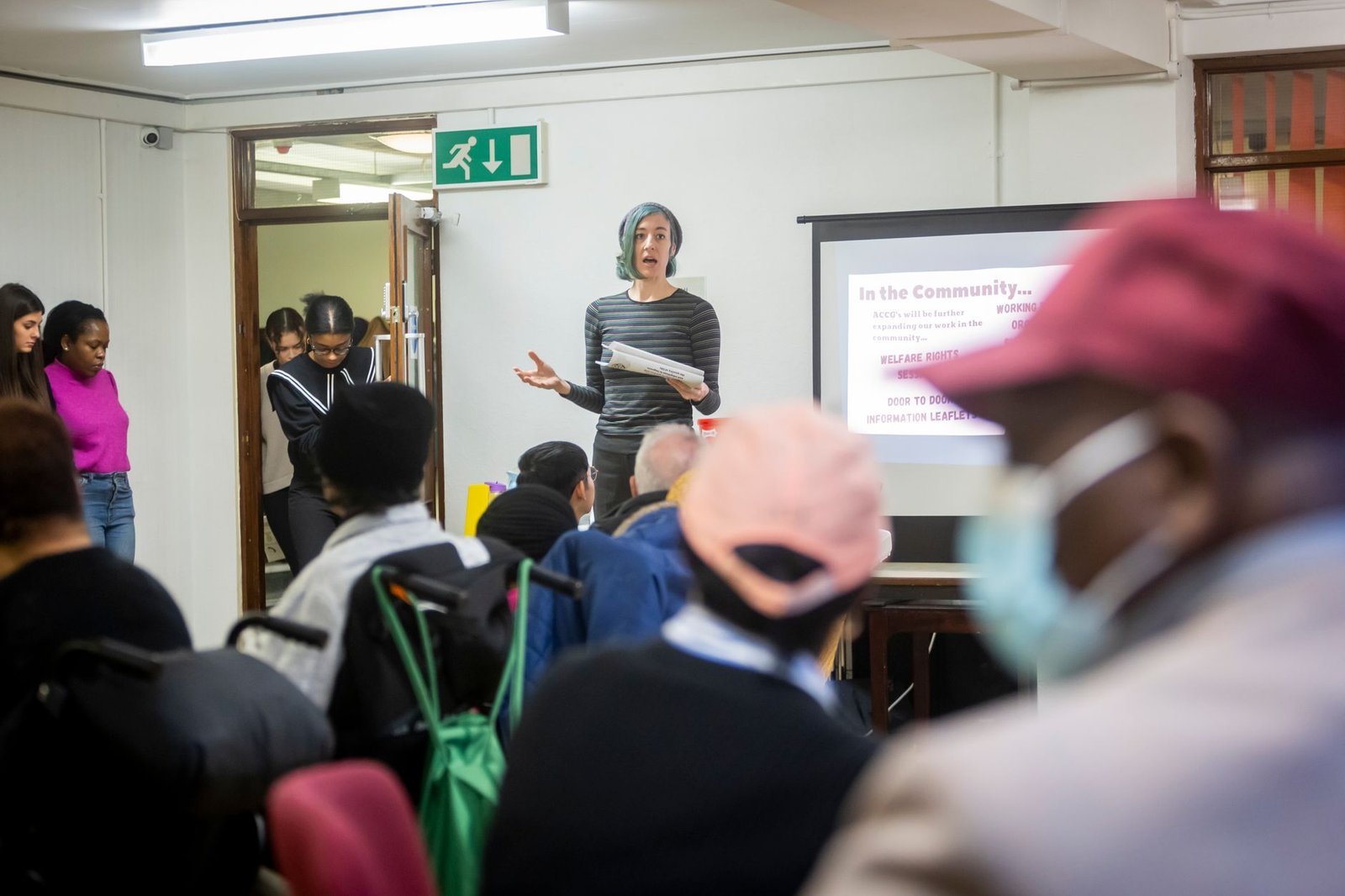 A group of diverse individuals engaged in a discussion about mental health, reflecting community involvement. — mental h…