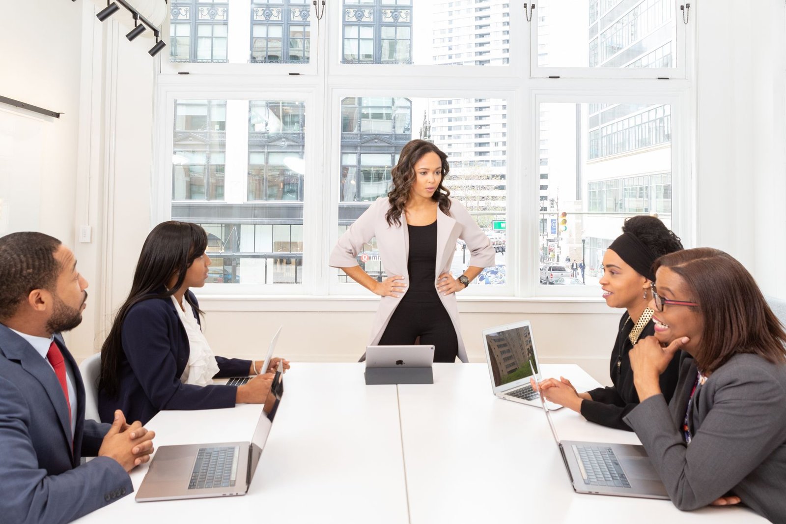 A group of diverse stakeholders engaged in a discussion about technology ethics, showcasing collaboration. — technology …
