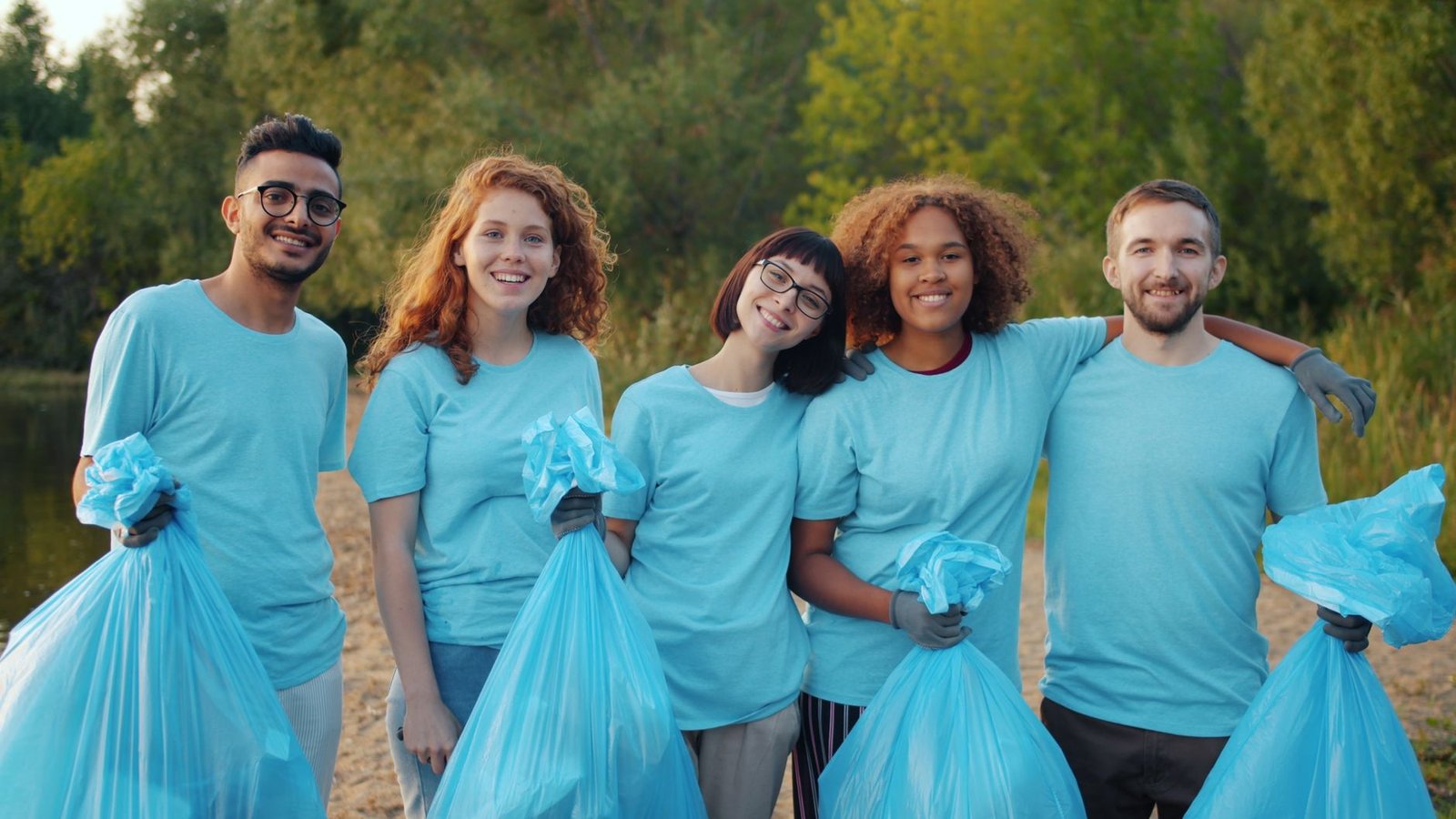 A photo of a community cleanup event, showcasing individuals coming together to promote environmental responsibility. — …