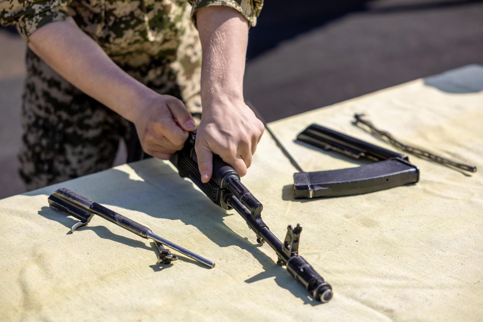 A photo of a community gun safety workshop in action — gun control debate