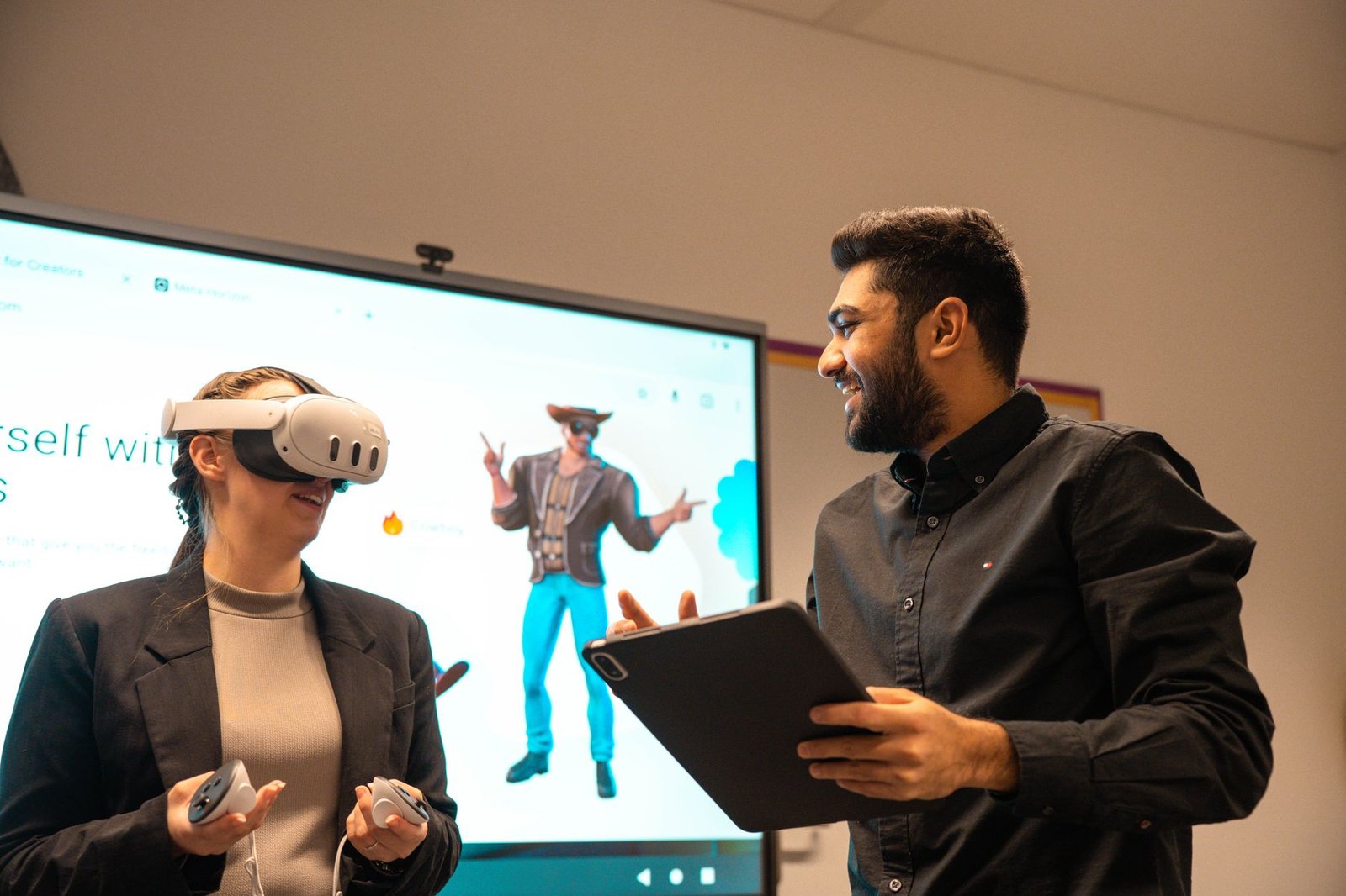 A photo of people interacting face-to-face in a tech-driven environment, highlighting balance. — technology and humanity