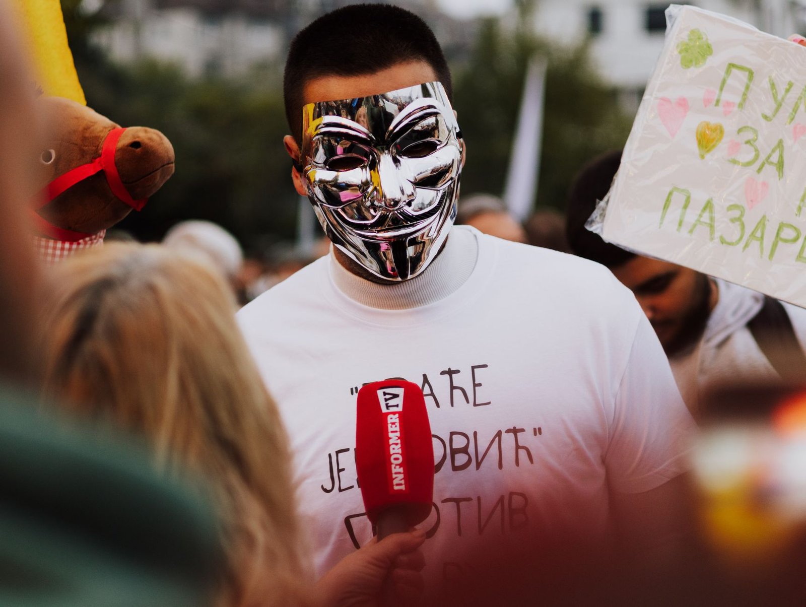 A split image depicting both a positive protest movement and a negative disinformation campaign on social media. — socia…