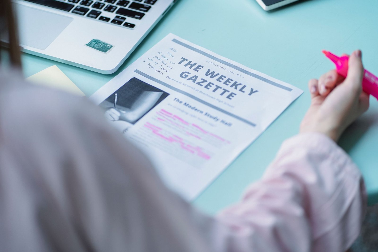 A student analyzing a debate topic with highlighted notes and resources. — debate research strategies