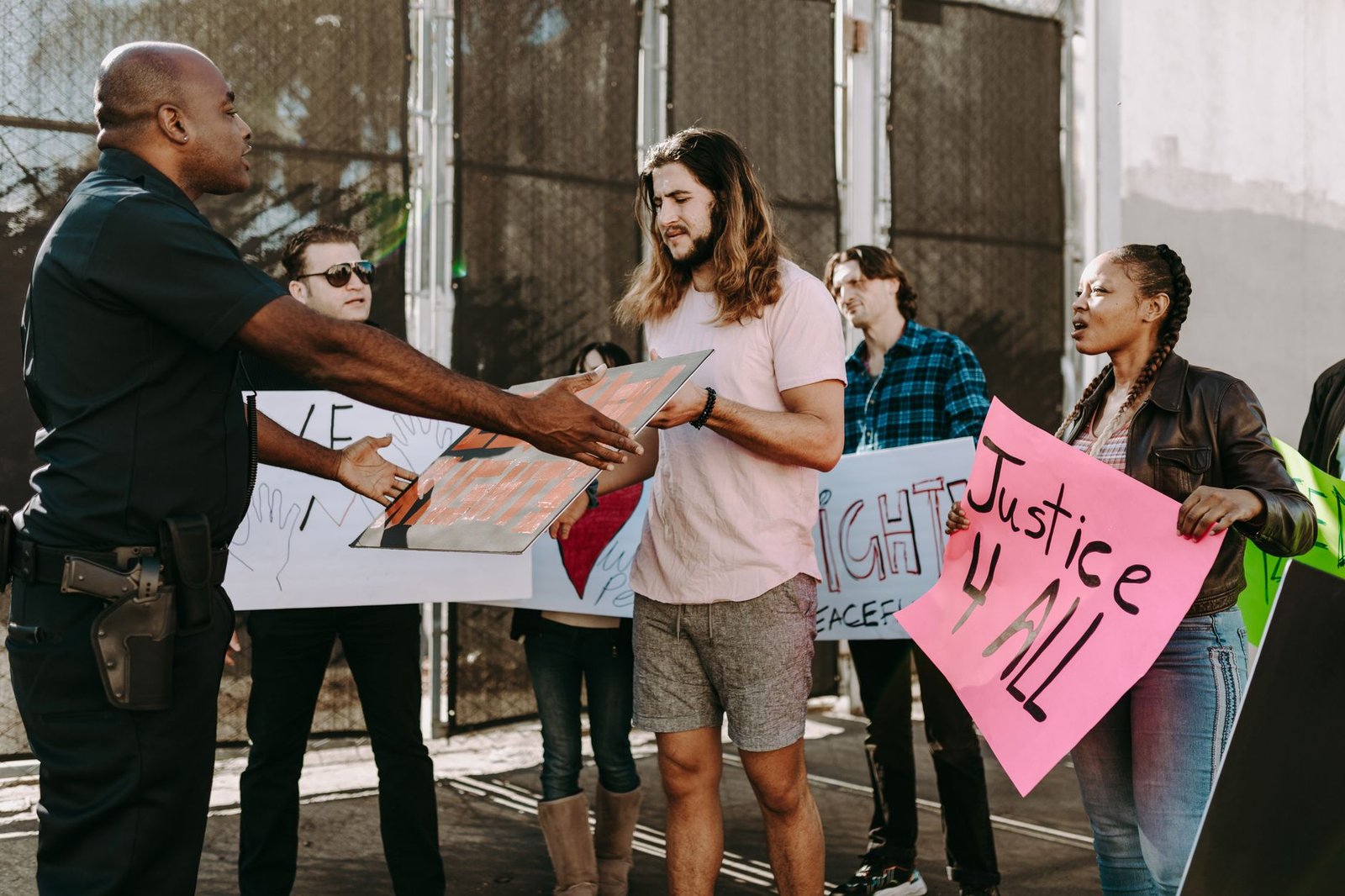 An illustration of a university campus with banners promoting free speech, emphasizing the importance of dialogue. — fre…